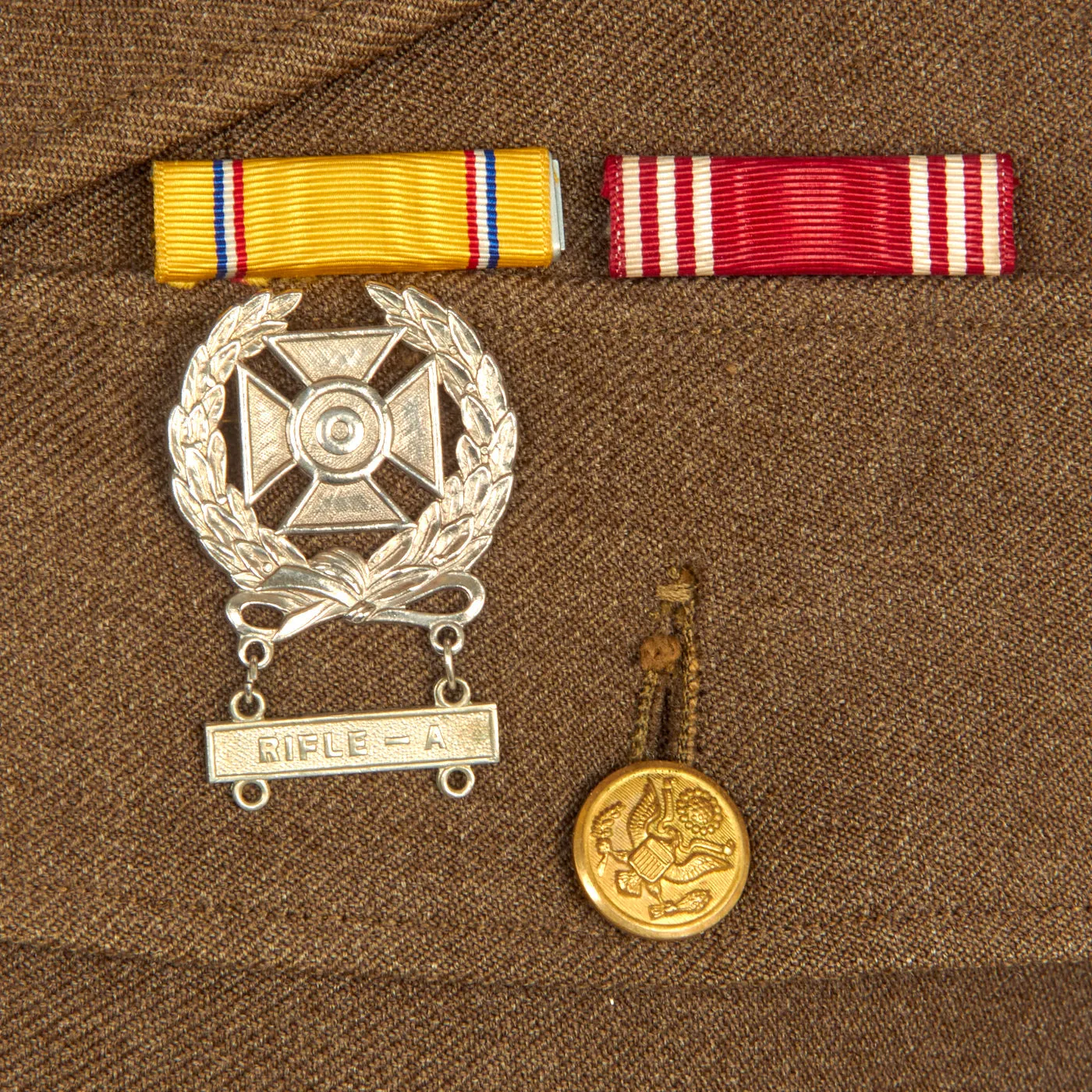 Original U.S. WWII Named 44th Infantry Division Large Uniform Grouping With Documents and Insignia - Over 50 Items