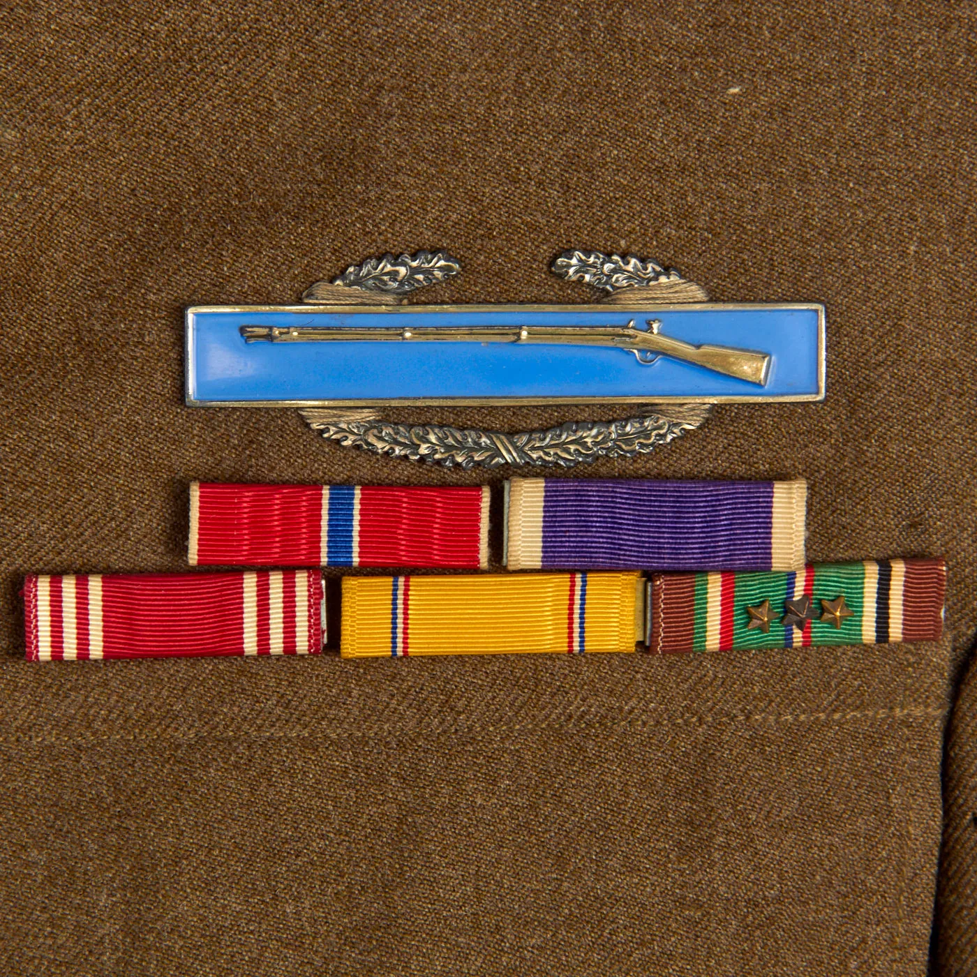 Original U.S. WWII Named 44th Infantry Division Large Uniform Grouping With Documents and Insignia - Over 50 Items